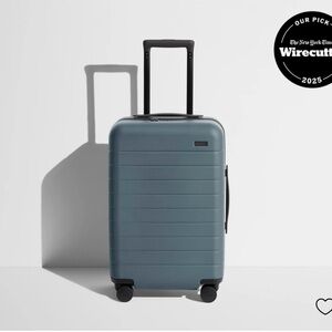 Away Coastal Blue Suitcase with Interior Compression System
